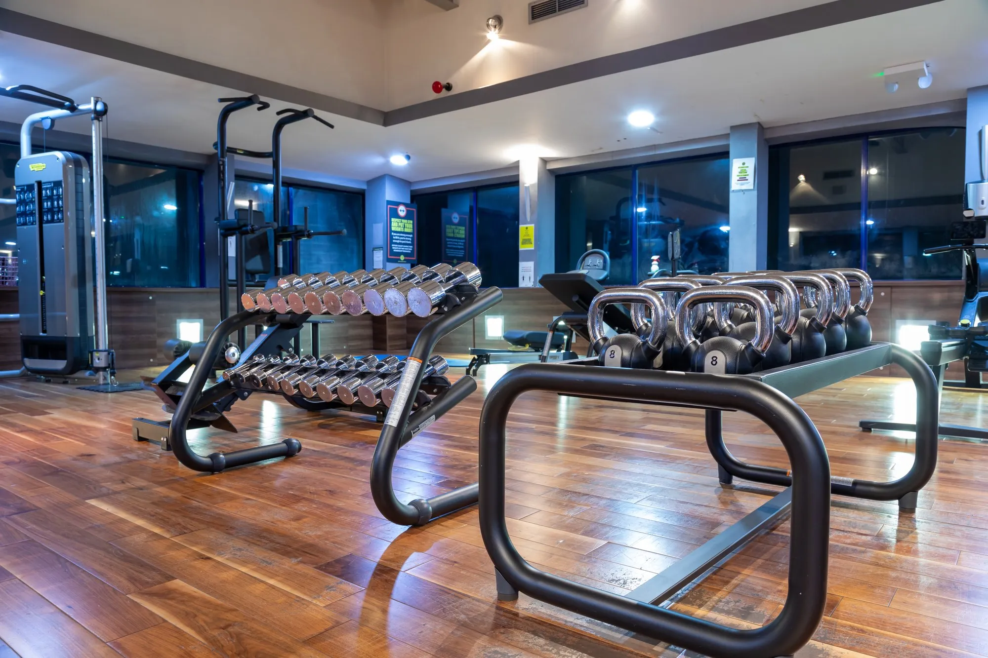 Dumbbell racks by the windows