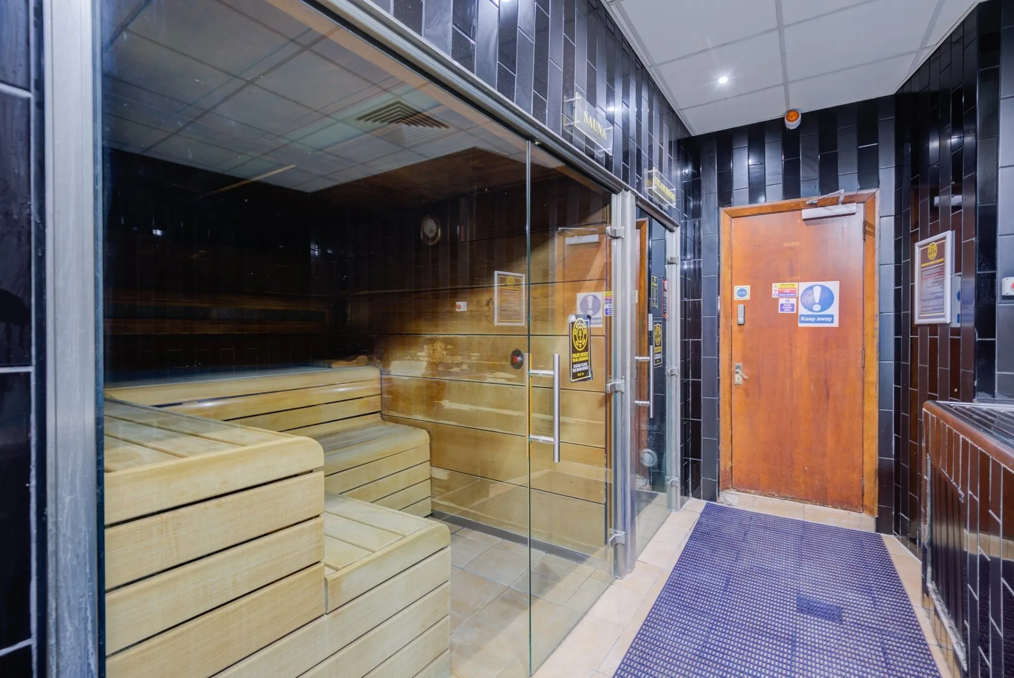 The sauna, seen through its glass door