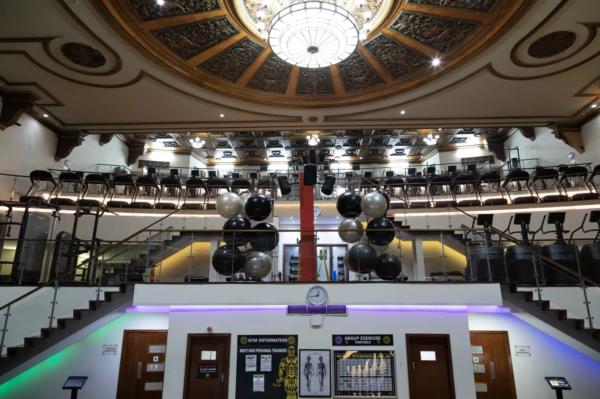 The main hall at Gold's Gym Harrow, under the Granada cinema's domed ceiling and chandelier