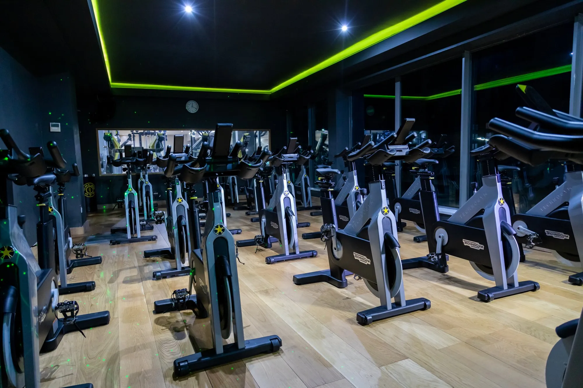 The cycle studio at Gold's Gym Hounslow, rows of indoor bikes